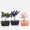 Mini arbres en pierres précieuses sur une base en orgonite - Assortiment (15 pierres)